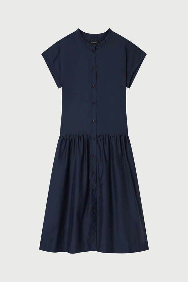Navy blue dress on a light gray background