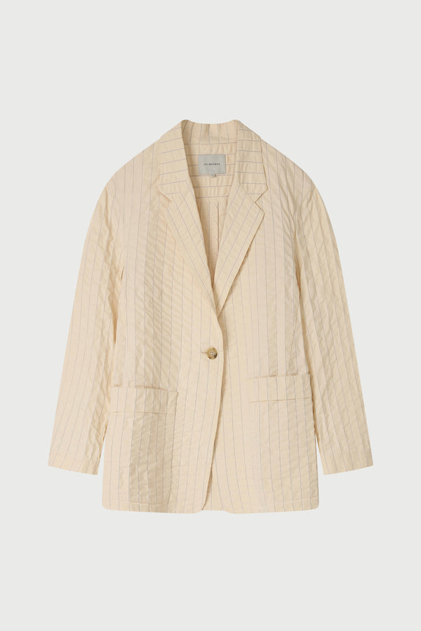 Beige blazer on a light gray background
